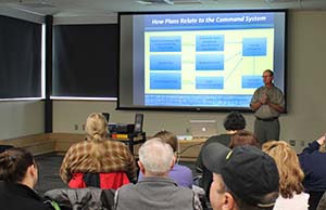 Tim Robertson, council contractor, leads a discussion during the Seward workshop on how contingency plans relate to the Incident Command System. Photo by Amanda Johnson.