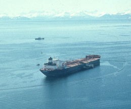 Exxon Valdez tanker leaking oil in Prince William Sound, April 13, 1989. Photo by Charles N. Ehler. Exxon Valdez Oil Spill Collection, ARLIS.